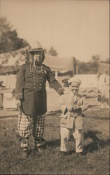 Two Performers in Costume Pose Before Camp Postcard