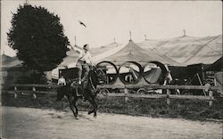 Stunt Jockey Stands on his Horse Postcard