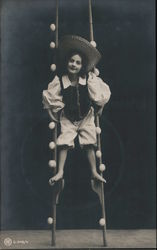 Small child standing on stilts Circus Postcard Postcard Postcard