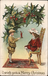 I Wish you a Merry Christmas - A Boy and Girl Under Holly Children Postcard Postcard Postcard