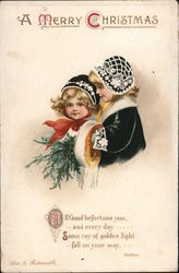 A Merry Christmas - Two Children in Bonnets Hold Evergreen Postcard