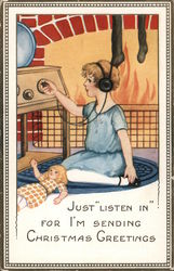 A Young Girl Listening to the Radio in Front of a Fire Children Postcard Postcard Postcard