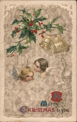 A Merry Christmas to You - Holly and Bells hang above the Busts of Angels Postcard Postcard Postcard