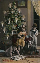 Children with Their Toys in Front of the Christmas Tree Postcard Postcard Postcard