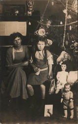 A Little Girl and Woman Next to Dolls Under a Christmas Tree Children Postcard Postcard Postcard