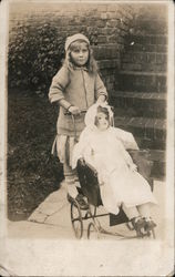 A Girl Pushing a Doll in a Play Stroller Dolls Postcard Postcard Postcard