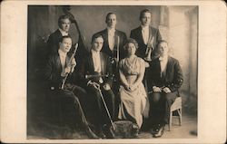 Group Photo of Seven Member Band wearing Formal Clothing and Holding Musical Instruments Performers & Groups Postcard Postcard Postcard