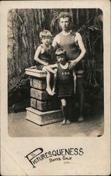 Picturesqueness. Man and two boys in swimsuits studio portrait Boyes Hot Springs, CA Postcard Postcard Postcard