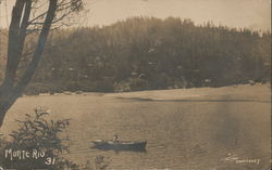 Lone Rowboat on the Russian River Postcard