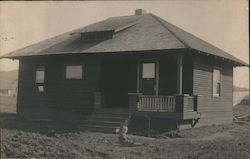 A child sits and Plays in the front yard of a home in Santa Rosa, California Postcard Postcard Postcard