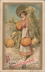 Hearty Thanksgiving Greeting. Woman in field gathering pumpkins Women Samuel L. Schmucker Postcard Postcard Postcard