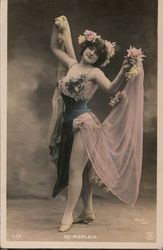 De Morlaix. Full bodied woman in pink corset dance outfit with flowers. Postcard