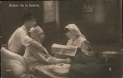 Autour de la guerre. Red Cross nurse reading paper to bed ridden soldier. Postcard Postcard Postcard