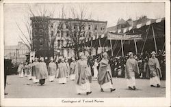 Contingent of Trained Nurses parading down street. Florence Nightingale banner. Postcard