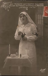 Red Cross Nurse with medicine bottle and table with candle Postcard Postcard Postcard