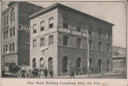 First brick building completed after the fire Postcard