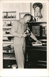 President Eisenhower in his Home with Stereoviewer Postcard