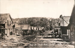 Main street, dirt road 1870 Postcard