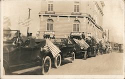 Parade with flags and fire trucks, early 20th century Postcard