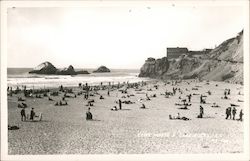 People on the beach with view of Cliff House and Seal Rock Postcard