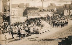 Parade with horse-drawn float Postcard