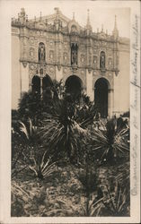 Building with ornamental statues and decorations over arched entrance San Francisco, CA Postcard Postcard Postcard