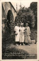 Among the Hollyhocks and bougainvillea in Capistrano Mission Grounds Postcard