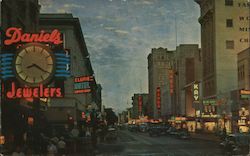 Night scene displays one of the busy streets of this central California city Sacramento, CA Postcard Postcard Postcard