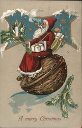 A merry Christmas - Santa sitting on walnut Santa Claus Postcard Postcard Postcard