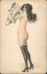 Nude woman in stockings and heels putting on nightgown signed Postcard