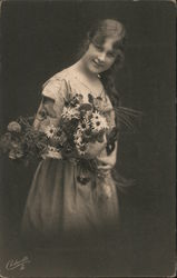 Woman with a bouquet of daisies Postcard