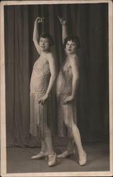 Two women dancers posing, in show costumes Postcard