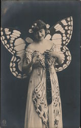 Woman wearing butterfly costume with butterfly wings Postcard