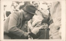 Will Rogers greeting a young fan Postcard