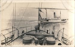 Church flag hoisted, view of ship crossing bow of ship. US flag, church flag Postcard