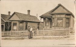 Woman and baby in front of a house, 1913 Oregon Buildings Postcard Postcard Postcard