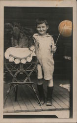 Boy with a balloon on a stick Postcard