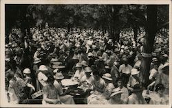 A thousand tables playing bridge Postcard