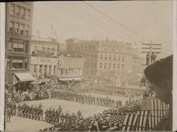 Military men marching down street. People on telephones watching. US Flags Original Photograph