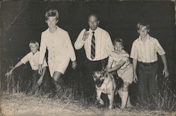 Happy Thanksgiving and re-election bid 1972. Family walking up hillside with family dog. Postcard