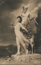 Dancer posing with status of a faun Dancing Postcard Postcard Postcard