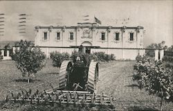 Mogul Oil Tractor cultivating the orchard on the International Harvester grounds Farming Postcard Postcard Postcard