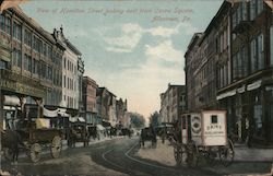 View of Hamilton Street looking east from Centre Square, including Koch Brothers store and dairy wagon Postcard