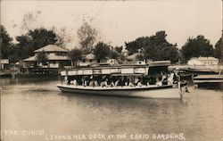 Leaving the dock at the Curio Gardens Postcard