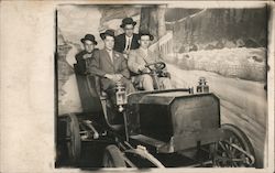 Four Men in a Car at a Photography Studio with a Wintery Backdrop Postcard Postcard Postcard