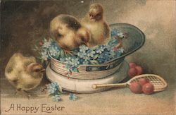 A Happy Easter, Three Yellow Chicks in a Cap Full of Blue Flowers with a Small Racket With Chicks Postcard Postcard Postcard