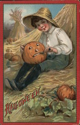 Halloween - A child in a hay field carves a pumpkin Postcard