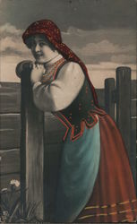 Polish Woman Leaning on Fence Postcard