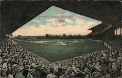 Interior view of the American League Base Ball Park with crowds watching a game Postcard