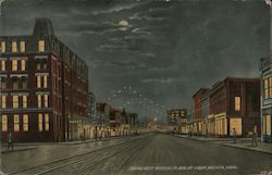 Looking West on Douglas Ave. at night Postcard